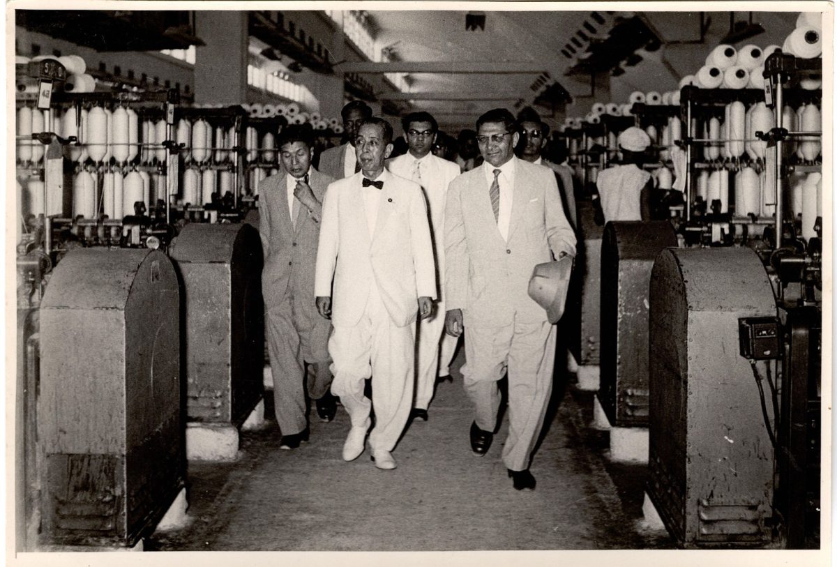 Ahmed Dawood providing a tour to Japanese Prime Minister Nobusuke Kishi of Dawood Cotton Mills