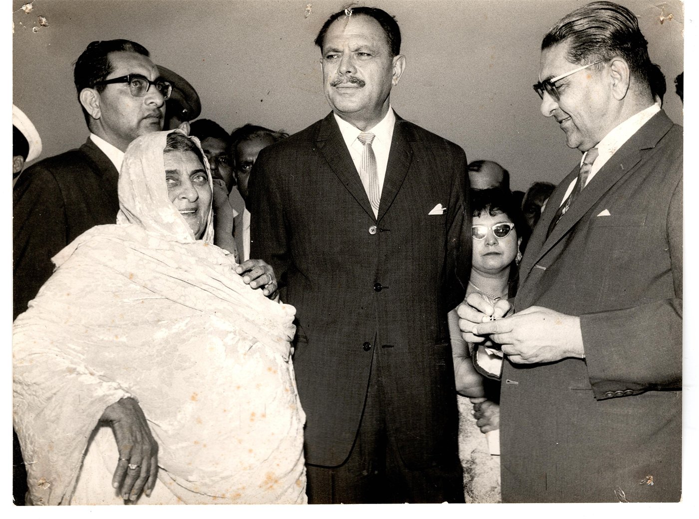 Hanifa Bai and her sons, Ali Mohamed and Ahmed Dawood, with President Ayub Khan at the Dawood College of Engineering and Technology inauguration